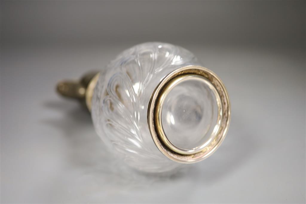 An early 20th century French white metal mounted glass claret jug, maker AL, height 23cm.